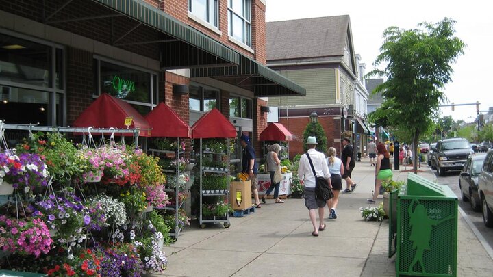 Photo of people shopping outside